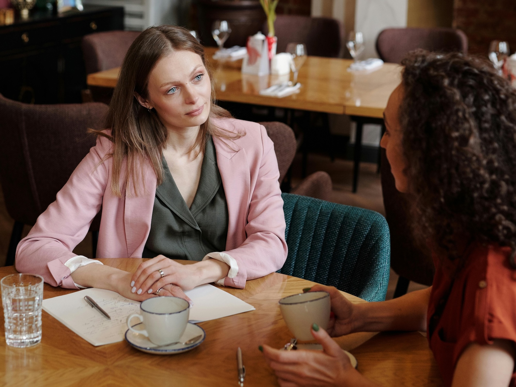 Woman in a focused coaching conversation